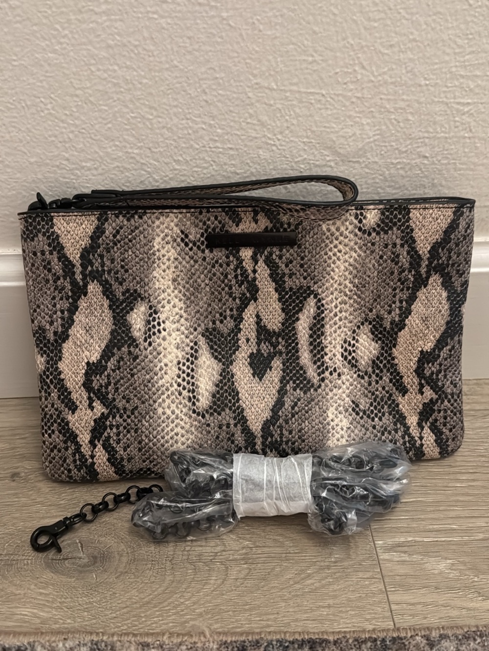 Kelly Wynne Snake-Print Wristlet Clutch in Beige and Black